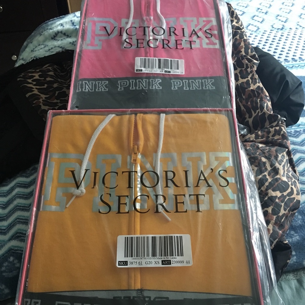 Victoria Secret sweater and black leggings.
